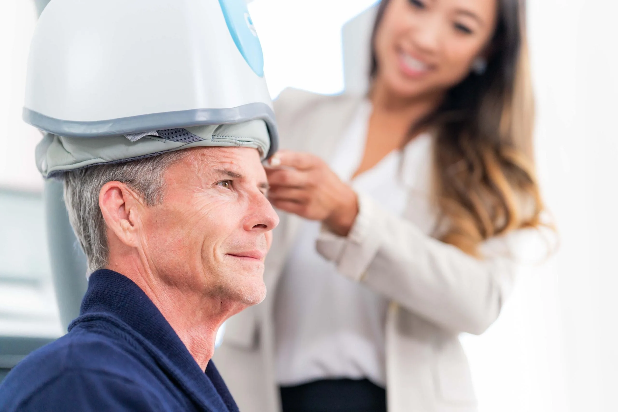 Man receiving TMS treatment