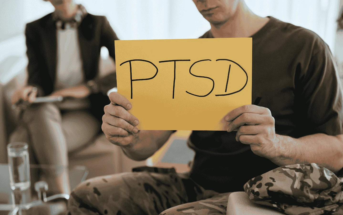 Veteran Addressing PTSD in Therapy Session